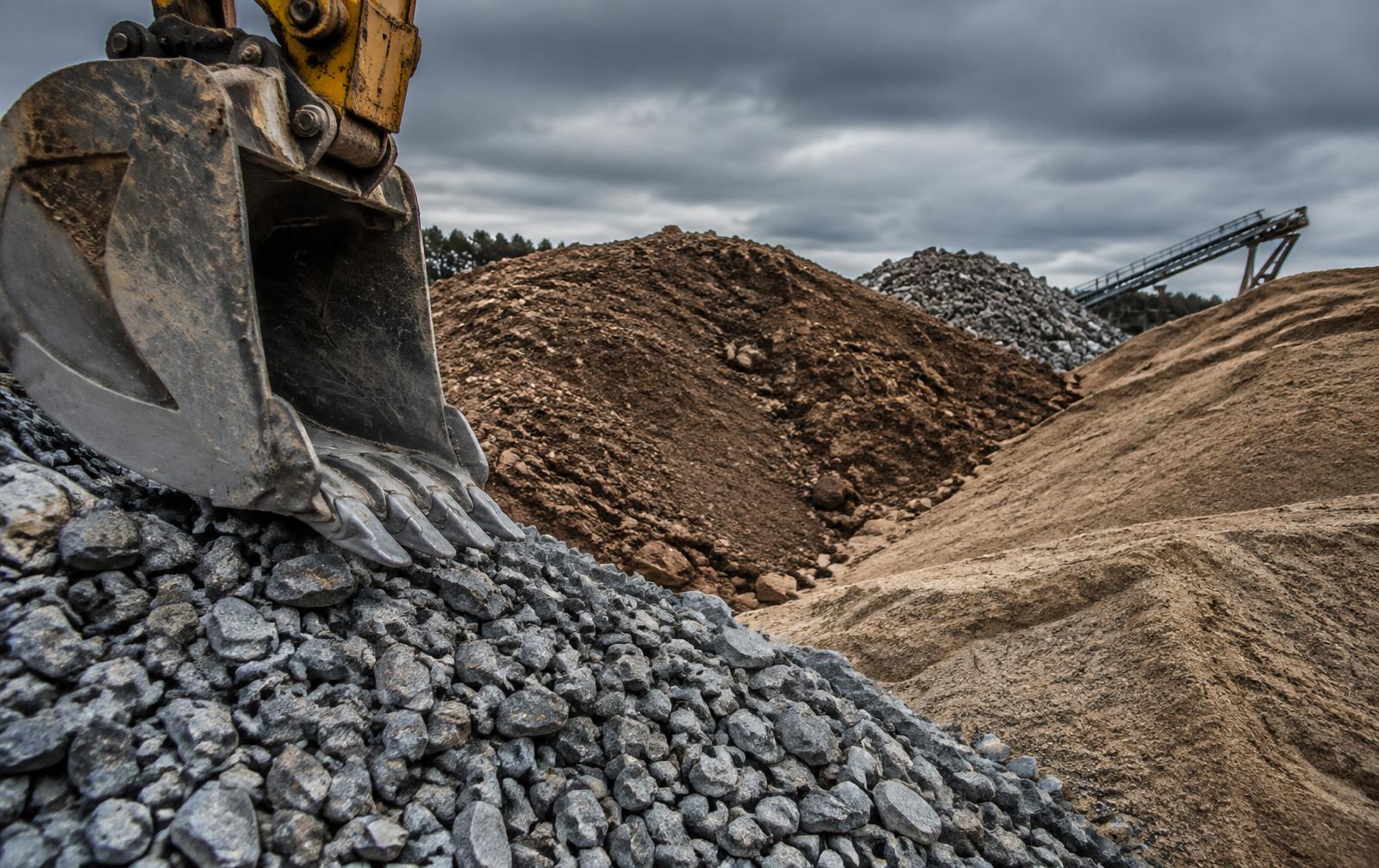 Piles of rock, dirt and sand